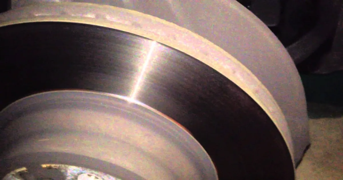what do warped rotors sound like